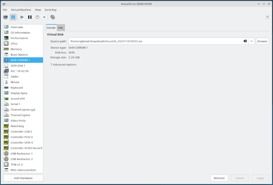 libvirt VM reattaching CDROM